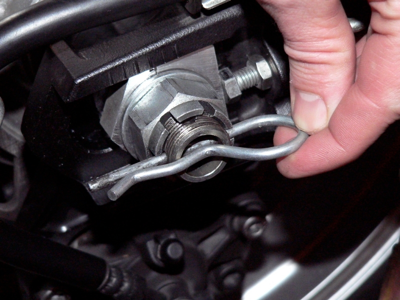 Drive Chain Slack Adjustment