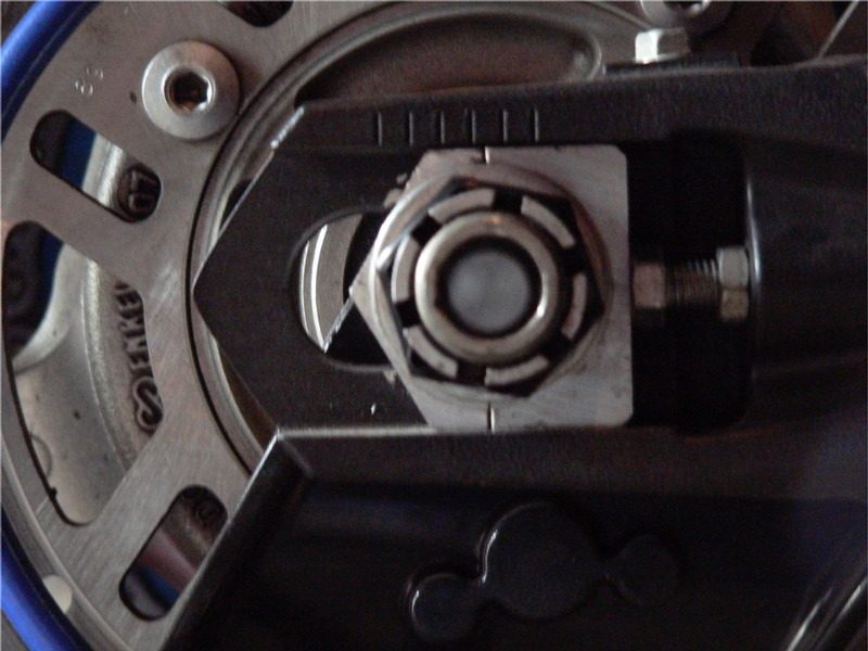 Drive Chain Slack Adjustment