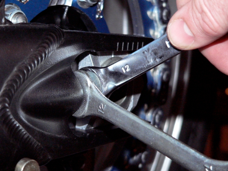 Drive Chain Slack Adjustment